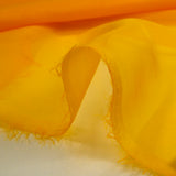 Mousseline de 100% soie unie jaune soleil