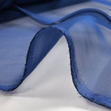 Mousseline 100% soie unie bleu foncé changeant noir