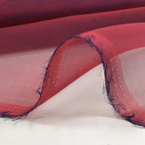 Mousseline 100% soie unie corail foncé changeant marine