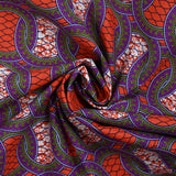 Coton imprimé ethnique Limmen fond rouge feu