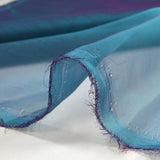 Mousseline 100% soie unie bleu changeant violet
