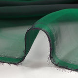 Mousseline 100% soie unie vert émeraude changeant prune