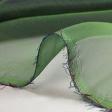 Mousseline 100% soie unie vert clair changeant indigo