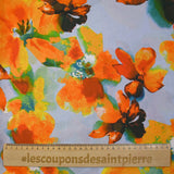 Jacquard de viscose satiné imprimé grandes fleurs fond ciel