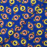 Coton imprimé ethnique Kampen orange et jaune fond bleu roi