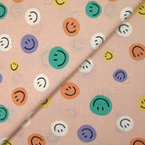 Coton imprimé smiley fond rose chair