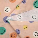 Coton imprimé smiley fond rose chair