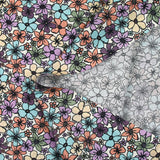 Coton imprimé les fleurs de Cassandra fond blanc cassé