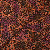 Viscose imprimée léopard orange fluo fond marron