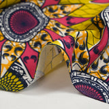 Coton imprimé ethnique Eindhoven fuchsia fond jaune
