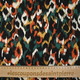 Satin de viscose imprimé Vénus orange brûlé fond noir