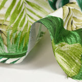 Polycoton imprimé jungle de feuilles vert fond blanc