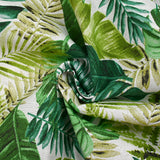 Polycoton imprimé jungle de feuilles vert fond blanc