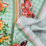 Coton imprimé frise vitaminée orange et vert