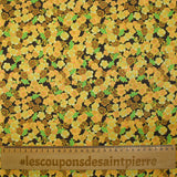 Cotton printed with yellow cherry blossoms, brown background