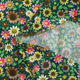 Cotton printed field of daisies with petroleum background