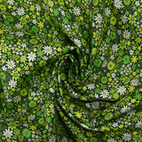 Cotton printed meadow in flowers anise dark green background