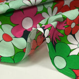 Water green, meadow green and magenta disco flower print cotton