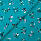 Popeline de coton imprimée bouquet champêtre fond turquoise
