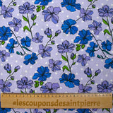 Popeline de coton imprimée fleurs grimpantes fond à pois mauve