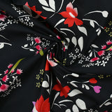 Popeline de coton imprimée archipel floral fond noir
