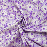 Popeline de coton imprimée vibration de marguerite fond violet