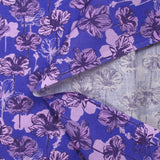 Cotton poplin printed silhouette in lilac flowers indigo background