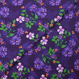 Popeline de coton imprimée flore fond violet foncé
