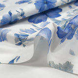 Popeline de coton imprimée porcelaine en fleurs bleues fond blanc