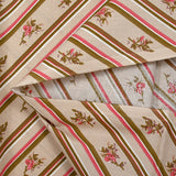 Popeline de coton imprimée diagonale de fleurs fond beige