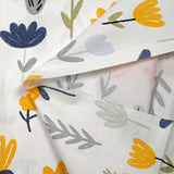 Popeline de coton imprimée dessin de fleurs fond blanc
