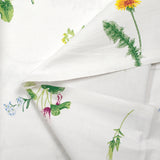 Popeline de coton imprimée collection de fleurs fond blanc