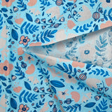 Popeline de coton imprimée bonheur floral fond bleu ciel