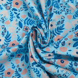 Popeline de coton imprimée bonheur floral fond bleu ciel