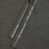 Tissu tailleur laine mélangée fantaisie gris clair fond noir