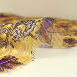 Mousseline imprimée bande satin violet fond ocre