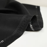 Tissu tailleur laine mélangée damier noir intense