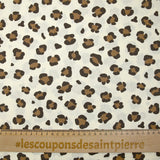 Coton imprimé léopard marron fond blanc cassé