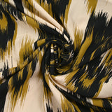 Viscose imprimée feuilles mystiques ocre fond beige