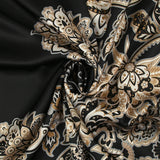 Satin polyester imprimé cachemire en frise fond noir