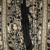 Satin polyester imprimé cachemire en frise fond noir