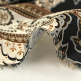 Satin polyester imprimé cachemire en frise fond noir