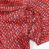 Banda raso muselina estampada ojo azul fondo rojo