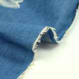 Chambray de coton brodé Anaïs fond denim
