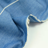 Chambray de coton brodé Lucie fond denim