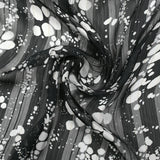 Mousseline imprimée bande satin effervescence fond noir