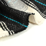 Lainage polyester à carreaux noir ligne turquoise