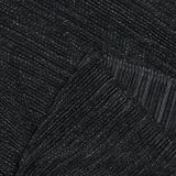 Polyester plissé irisé vert fond noir
