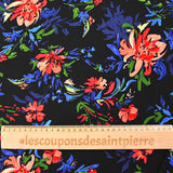 Viscose imprimée bataille de fleurs fond noir