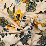Viscose imprimée fleurs ocre fond sable